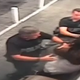 Video footage taken from a surveillance camera appears to show two Jacksonville, Fla., police officers grabbing Kelli Wilson and attempting to take her cellphone. Wilson says she was recording the officers as they were arresting her husband.
YouTube screenshot